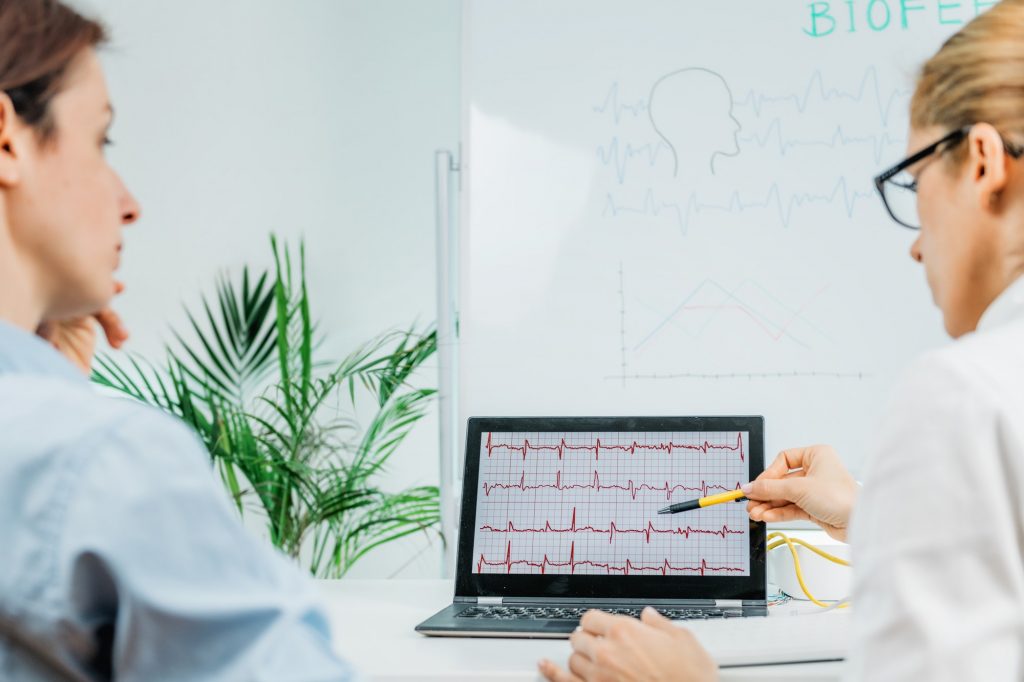 Biofeedback Training. Biofeedback Practitioner and Patient in Consultation