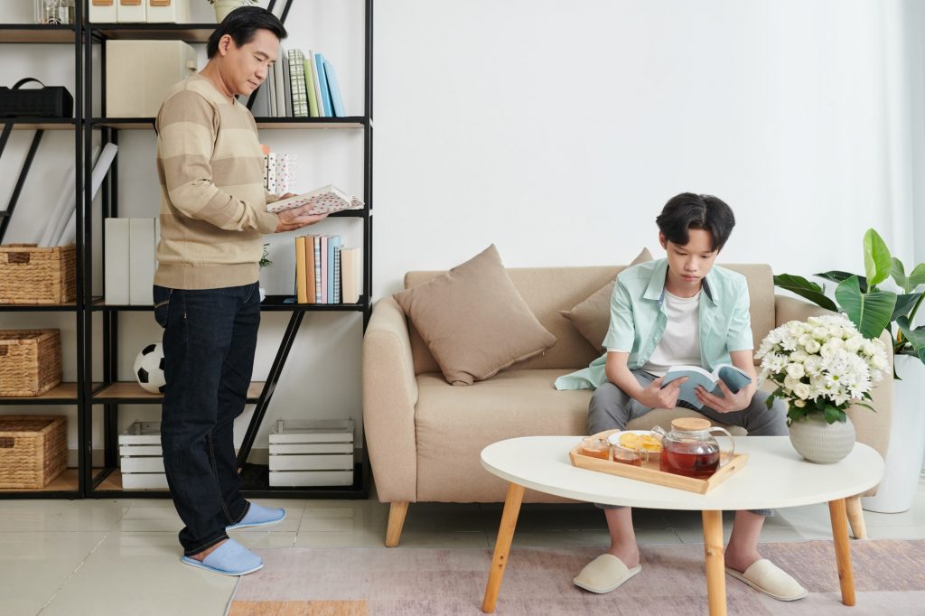 Father and Son Reading Books