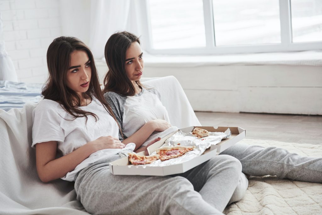 Suffers from overeating. Twins have full stomach with pizza. Nice bedroom at daytime