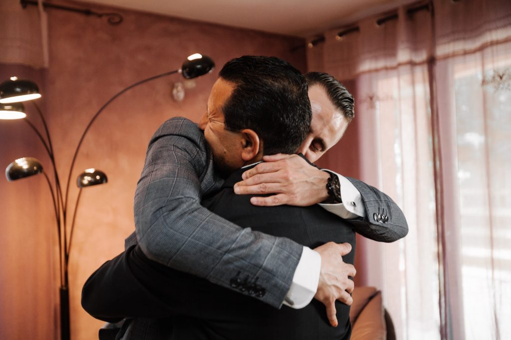Father and son hugging